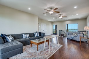 214 Peninsula Drive Burnet, TX 78611 - Photo 28 of 44 a living room with furniture and wooden floor
