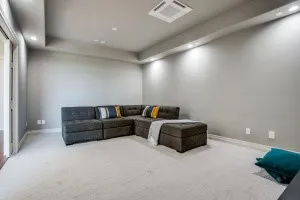 a room with a sink and a mirror