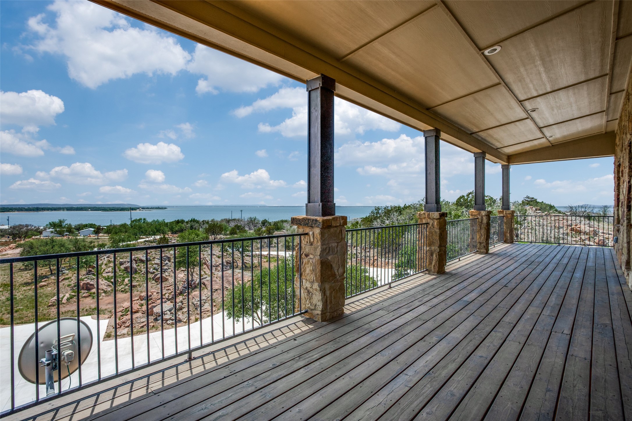 214 Peninsula Drive Burnet, TX 78611 - Photo 4 of 44 a view of balcony with wooden floor