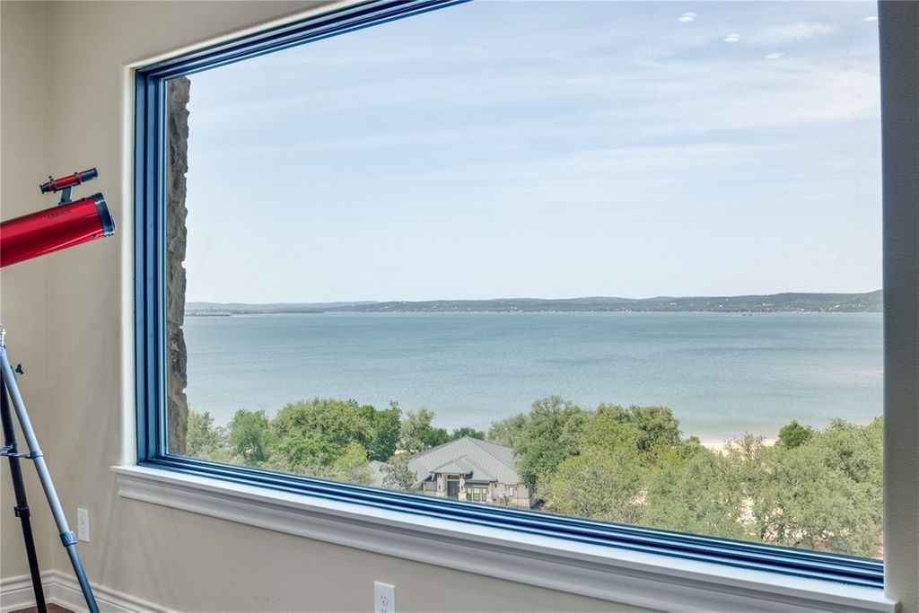 214 Peninsula Drive Burnet, TX 78611 - Photo 44 of 44 a view of a lake from a window