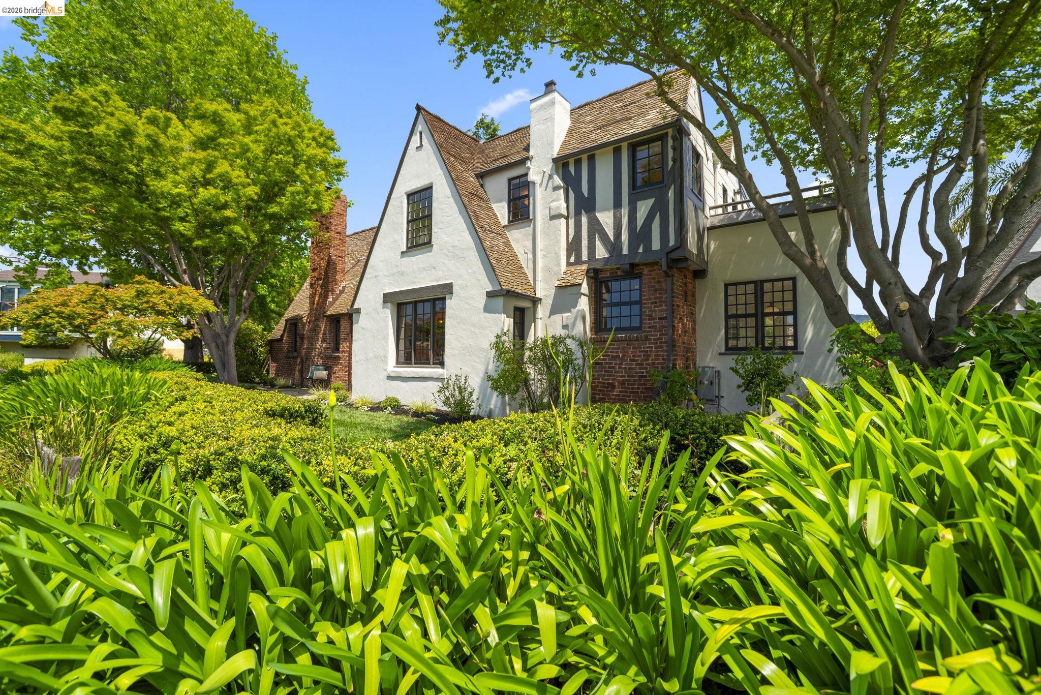 1087 Hubert Road Oakland, CA 94610 - Photo 61 of 67 Tudor-style residence featuring white stucco and dark timber detailing