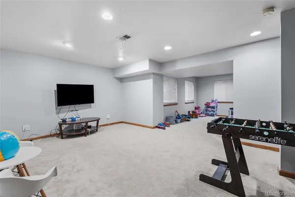 a room with furniture and toys