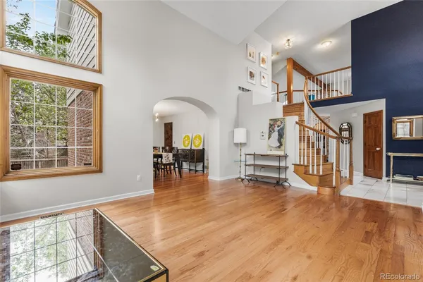 a view of livingroom with furniture and staircase