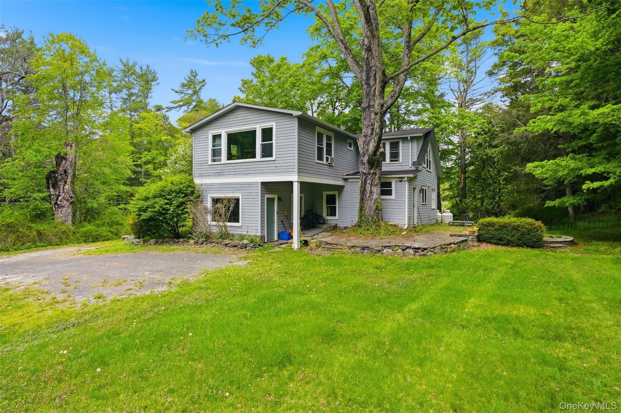 726 Wittenberg Road Mount Tremper, NY 12457 - Photo 28 of 32 a front view of a house with a yard