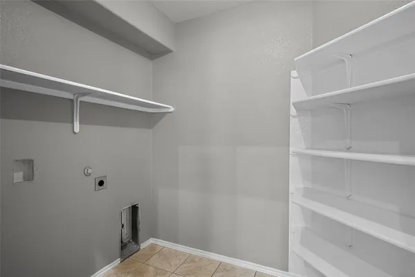 a view of small space with racks on the wall