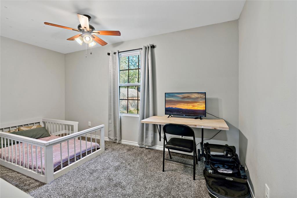 136 Northwest 33rd Paris, TX 75460 - Photo 10 of 14 a bedroom with furniture and windows