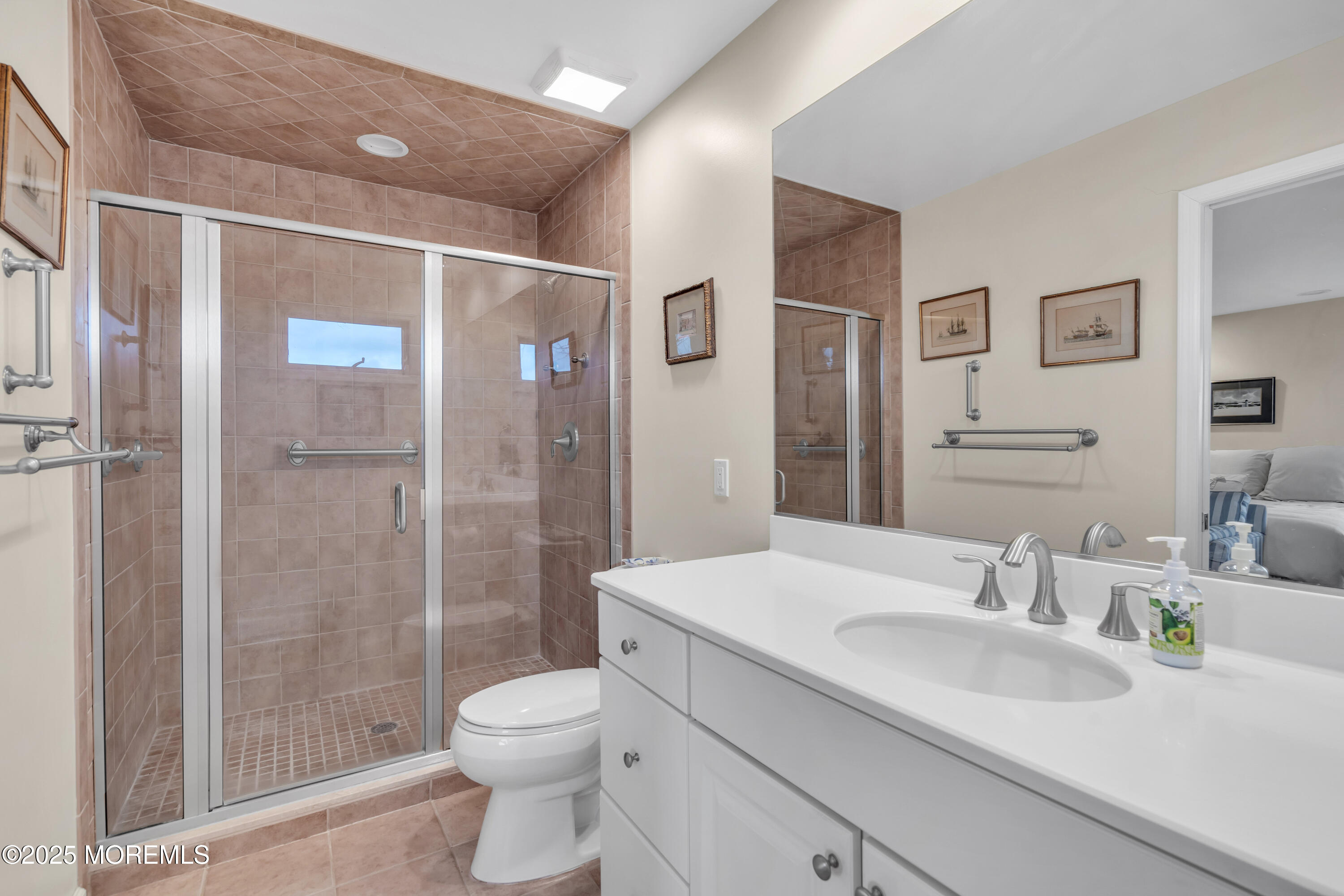 607 Ranger Drive Forked River, NJ 08731 - Photo 13 of 38 a bathroom with a granite countertop sink toilet and shower
