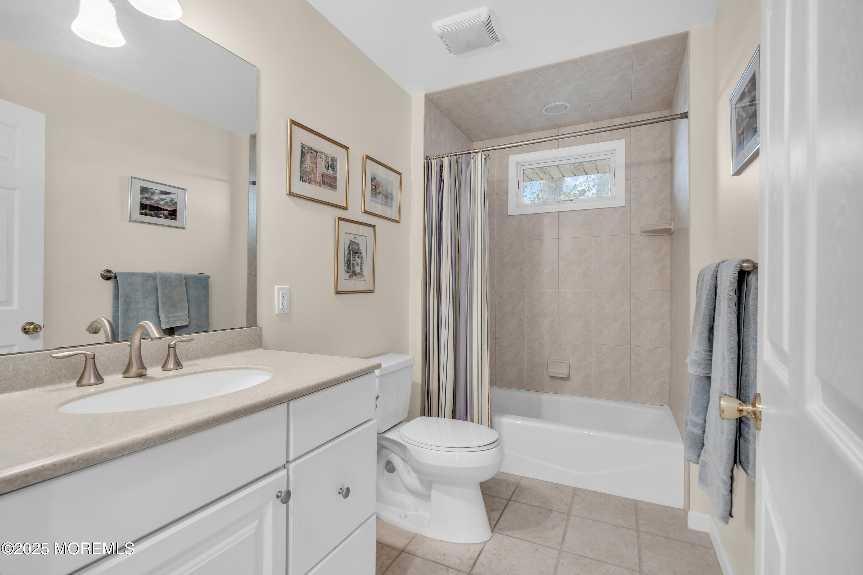 607 Ranger Drive Forked River, NJ 08731 - Photo 14 of 38 a bathroom with a sink toilet and shower