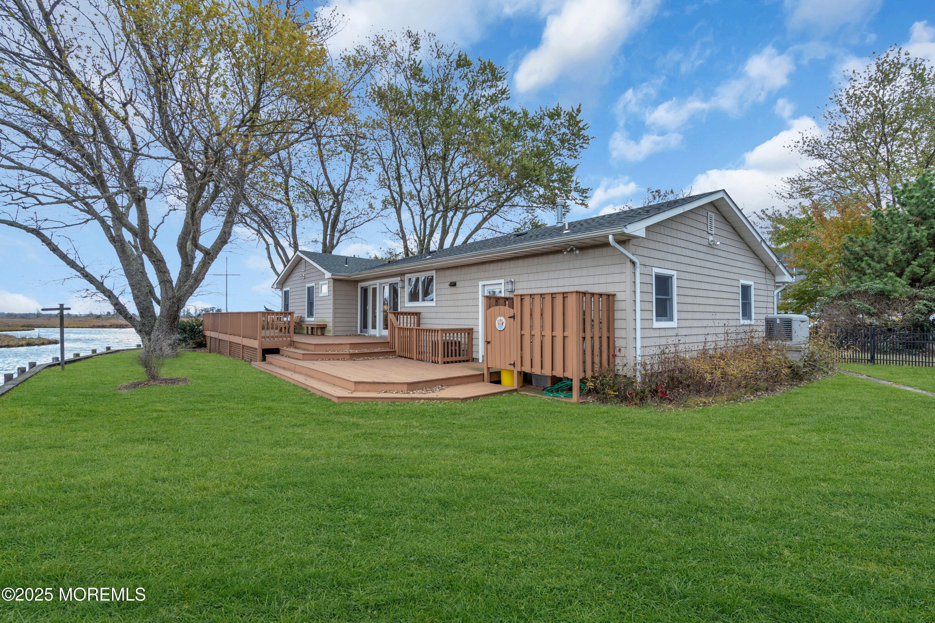 607 Ranger Drive Forked River, NJ 08731 - Photo 15 of 38 a view of a house with a yard and pathway
