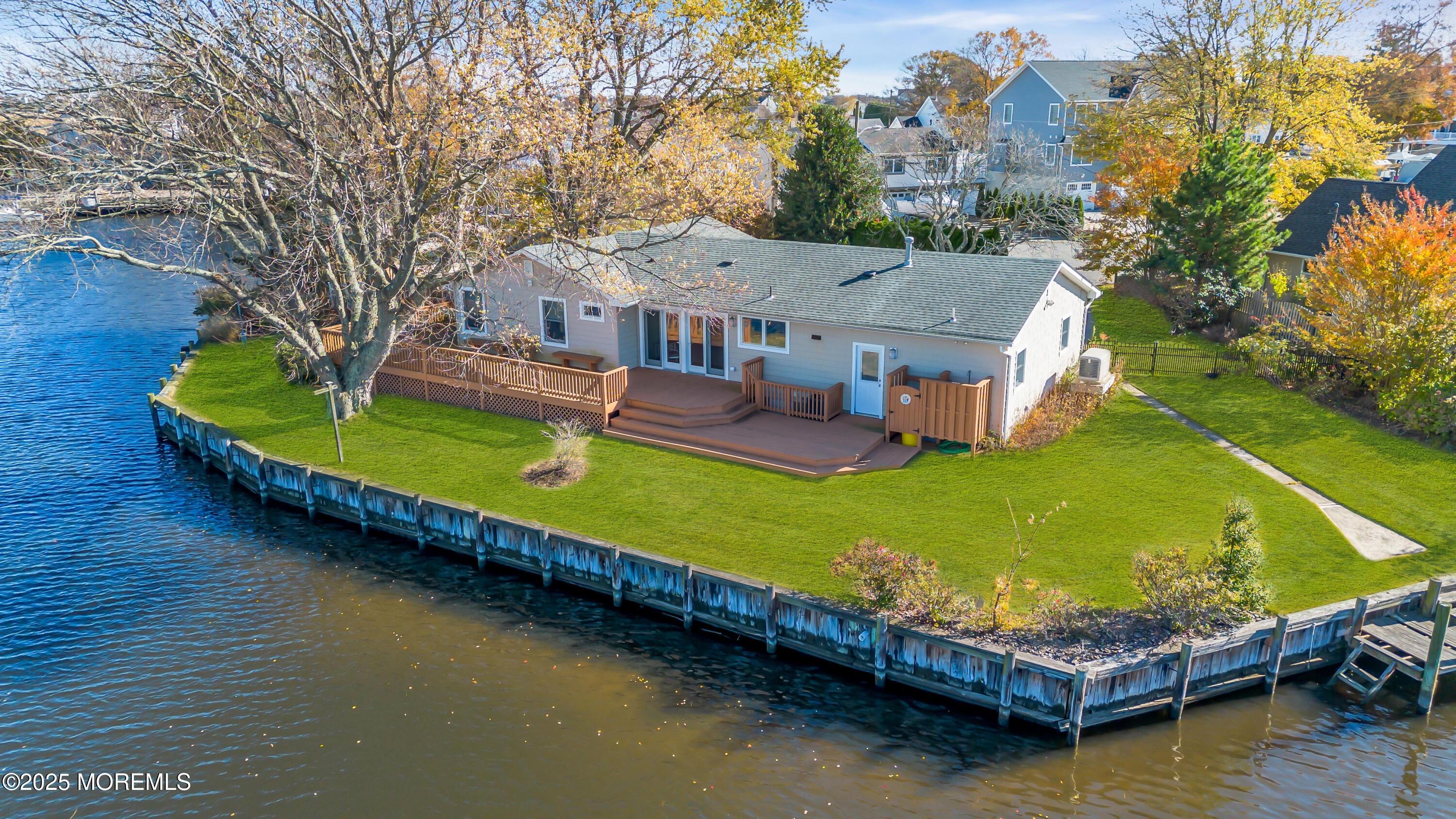 607 Ranger Drive Forked River, NJ 08731 - Photo 2 of 38 an aerial view of a house with a garden and swimming pool