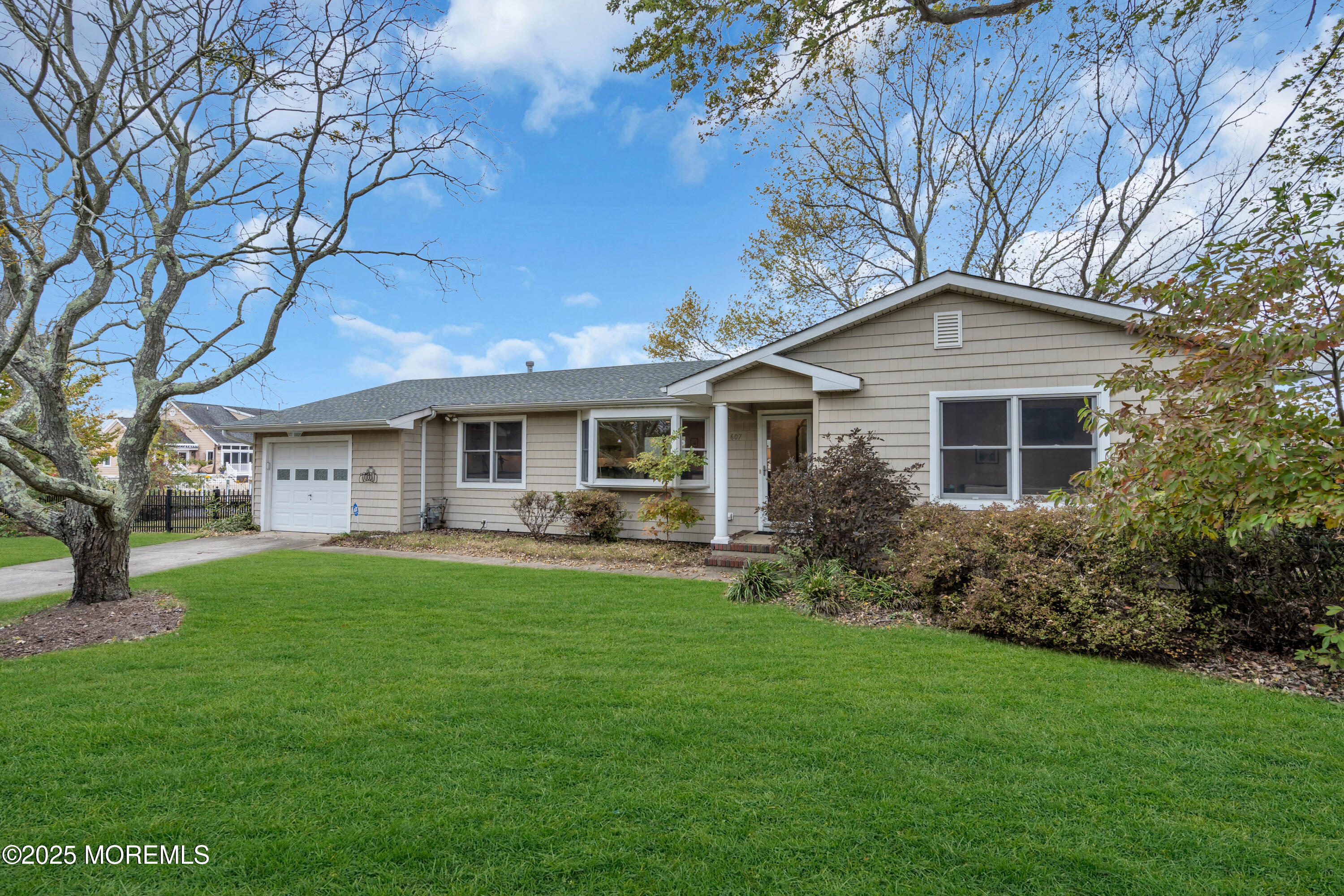 607 Ranger Drive Forked River, NJ 08731 - Photo 38 of 38 a front view of house with yard and green space