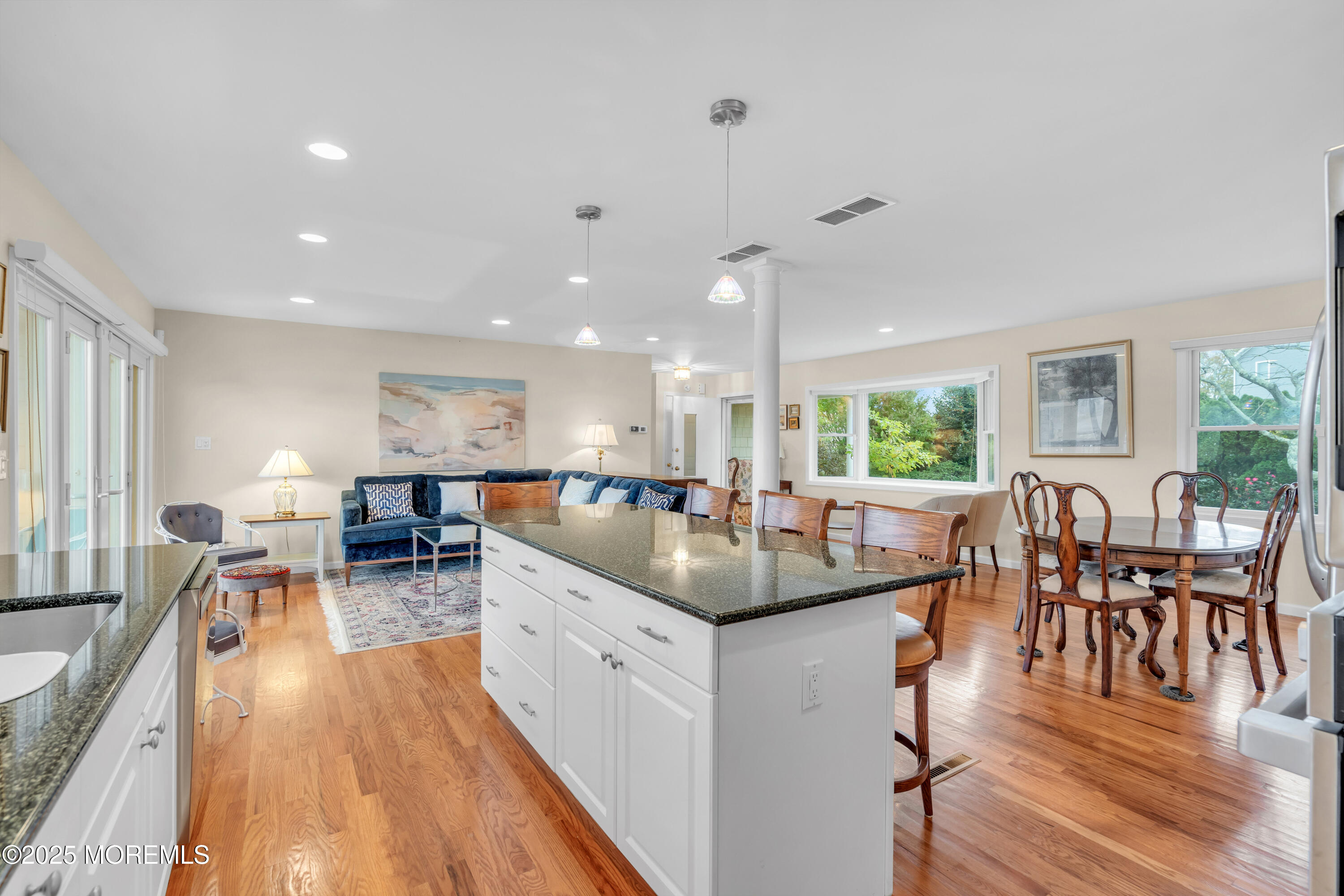 607 Ranger Drive Forked River, NJ 08731 - Photo 8 of 38 a kitchen with counter space dining table and chairs