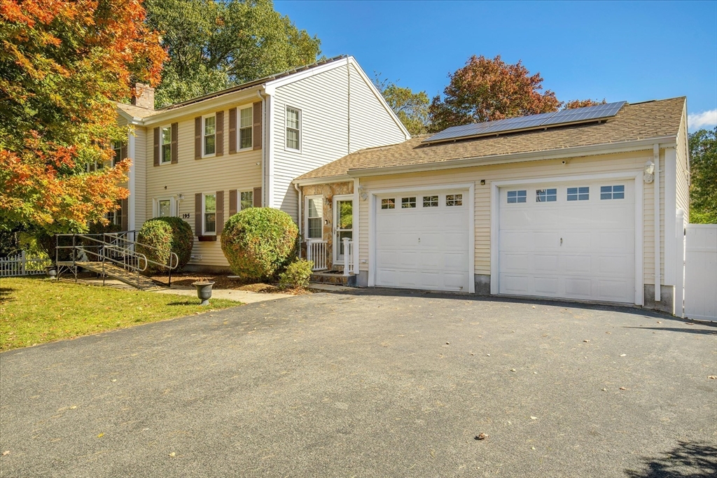 195 High Street Randolph, MA 02368 - Photo 1 of 42 a view of a house with backyard and a tree