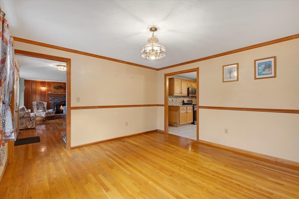 195 High Street Randolph, MA 02368 - Photo 20 of 42 a view of a livingroom with wooden floor
