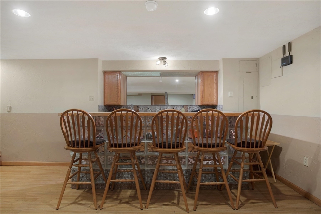 195 High Street Randolph, MA 02368 - Photo 29 of 42 a view of a dining room with furniture wooden floor and chandelier