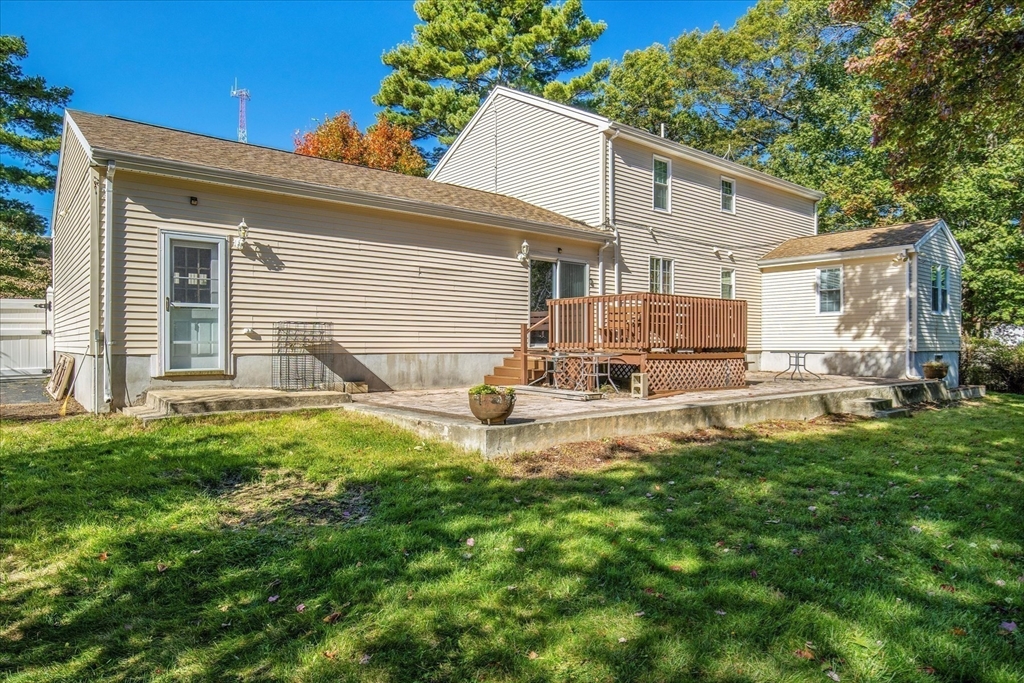 195 High Street Randolph, MA 02368 - Photo 37 of 42 a view of a house with backyard and sitting area