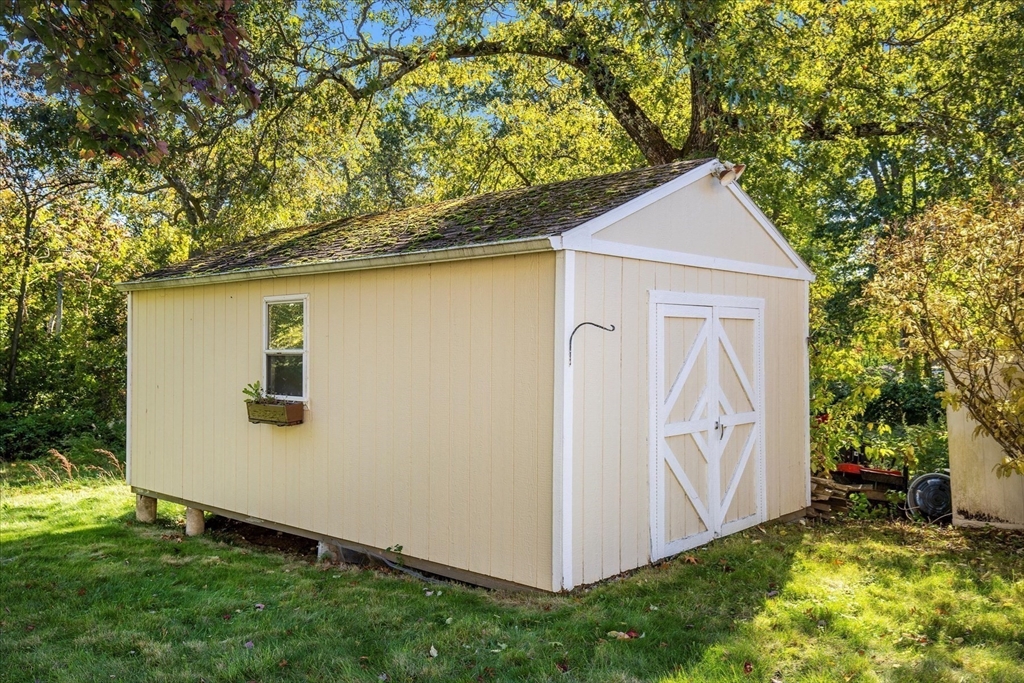 195 High Street Randolph, MA 02368 - Photo 41 of 42 a view of backyard with cabin