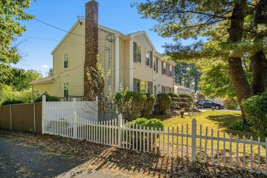 195 High Street Randolph, MA 02368 - Photo 6 of 42 a view of a wrought iron fences in front of house