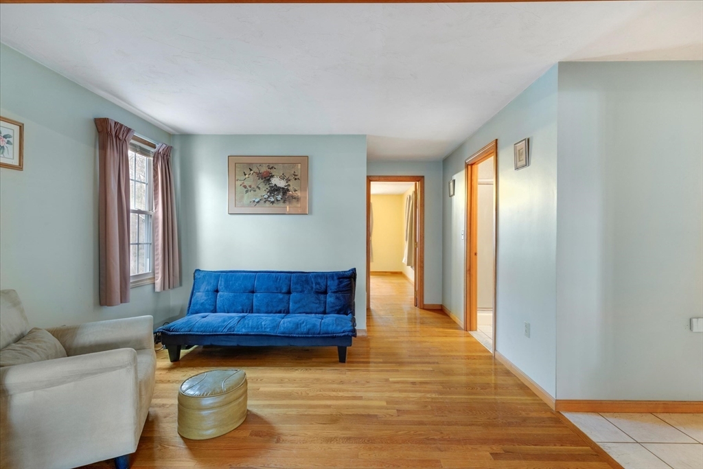 195 High Street Randolph, MA 02368 - Photo 10 of 42 a living room with couch and a window