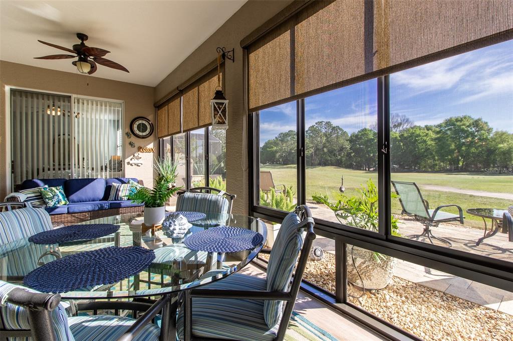 16123 Southwest 14th Avenue Road Ocala, FL 34473 - Photo 23 of 65 a living room with furniture and a large window