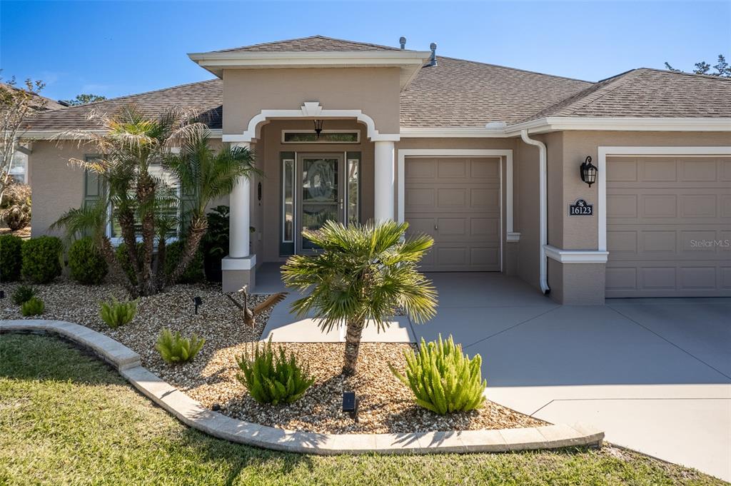 16123 Southwest 14th Avenue Road Ocala, FL 34473 - Photo 3 of 65 a view of a house with a tub