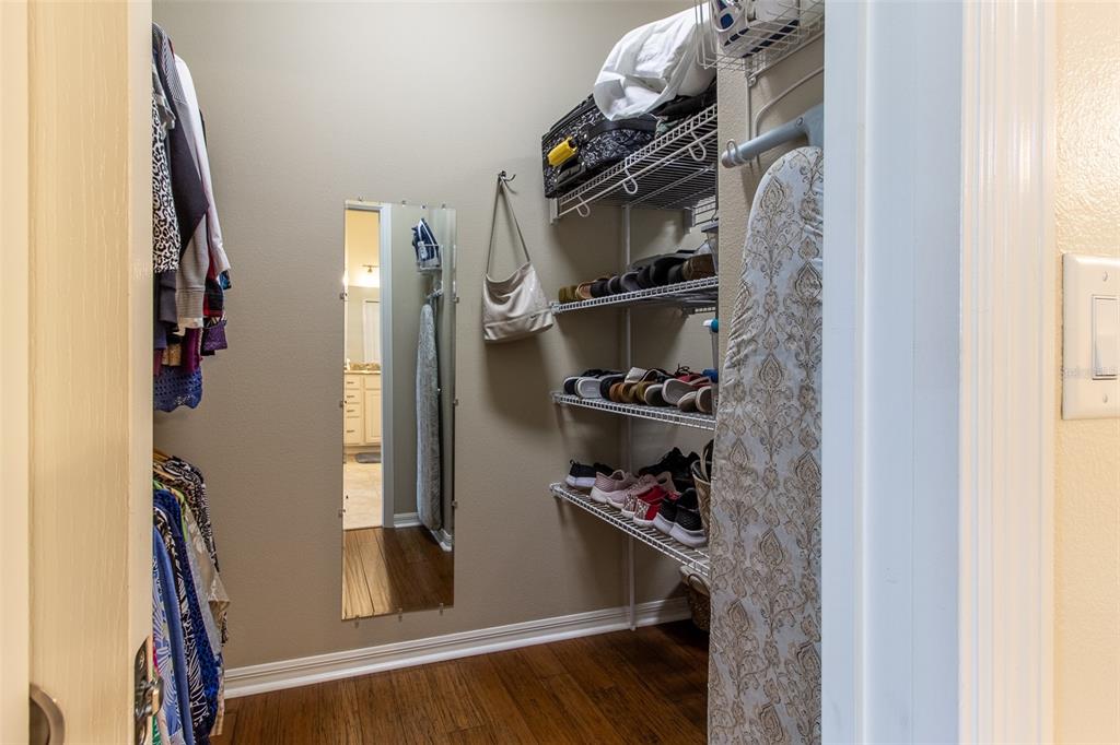 16123 Southwest 14th Avenue Road Ocala, FL 34473 - Photo 34 of 65 a view of walk in closet with clothes and shoes