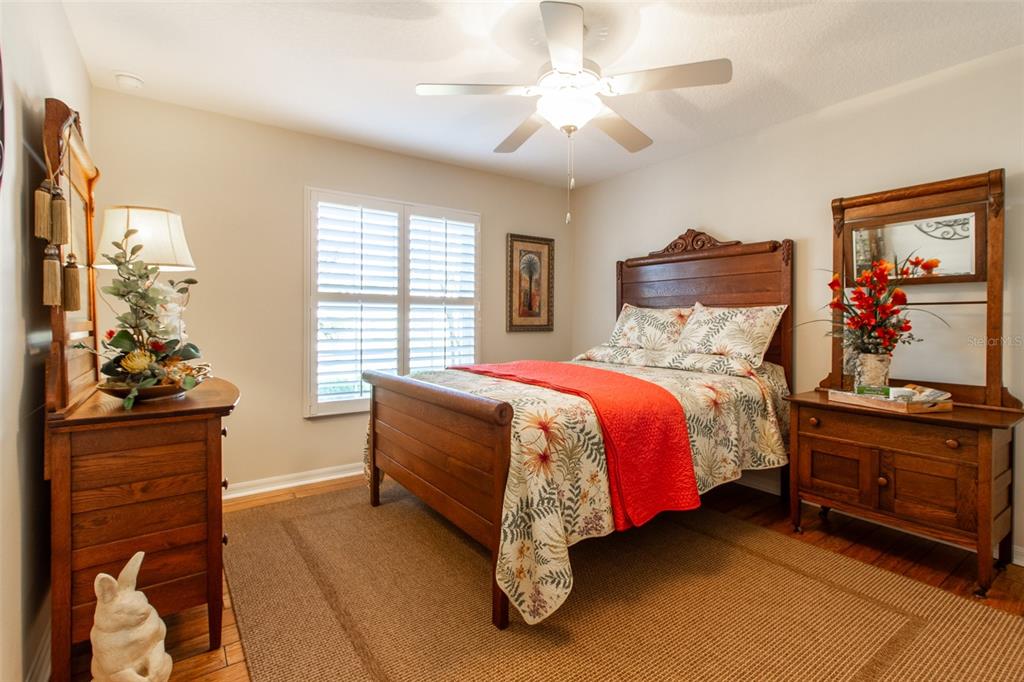 16123 Southwest 14th Avenue Road Ocala, FL 34473 - Photo 37 of 65 a bed room with a bed and a dresser