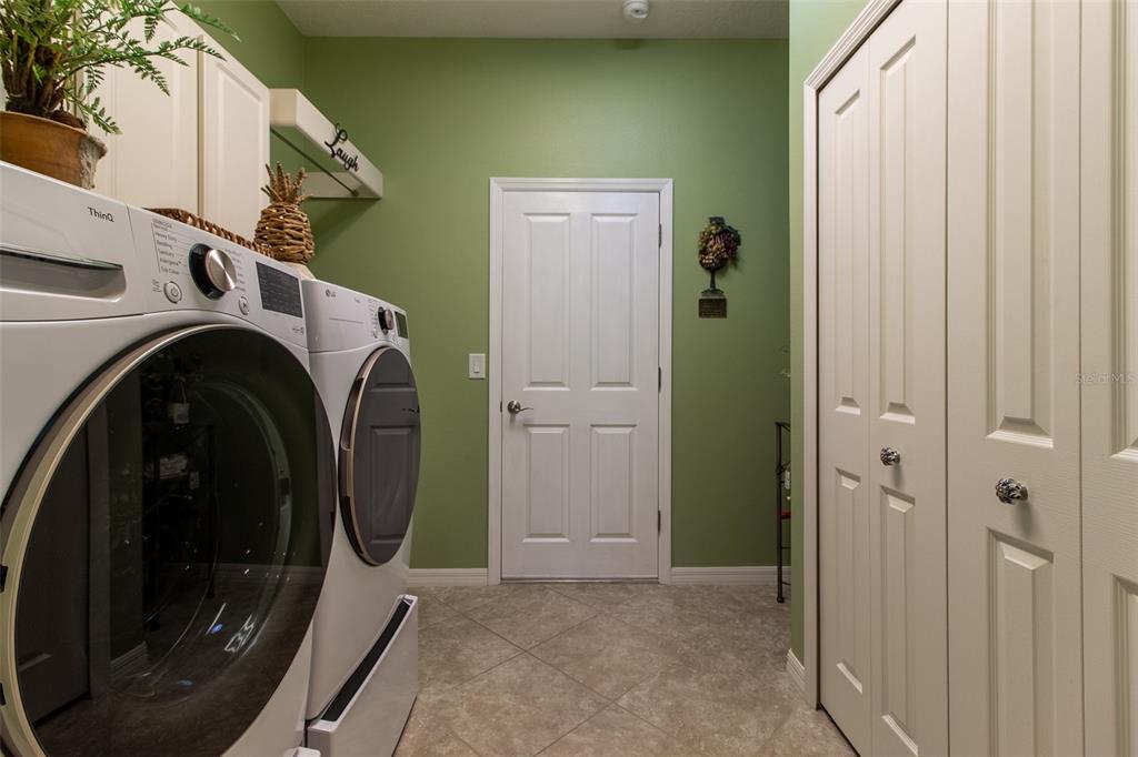 16123 Southwest 14th Avenue Road Ocala, FL 34473 - Photo 43 of 65 a utility room with dryer and washer