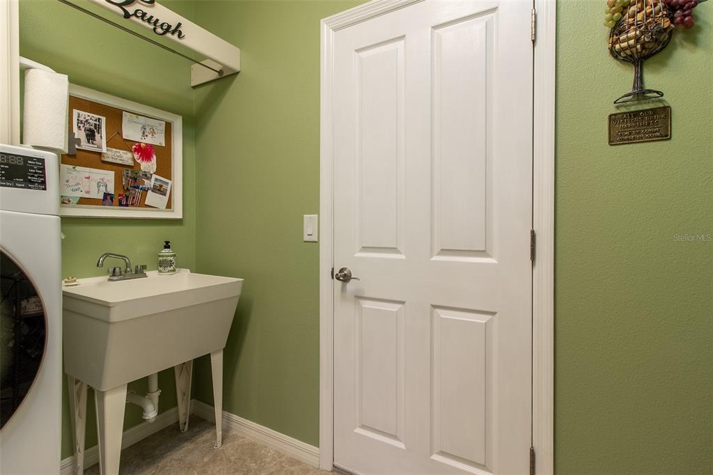 16123 Southwest 14th Avenue Road Ocala, FL 34473 - Photo 45 of 65 a bathroom with a sink and a mirror