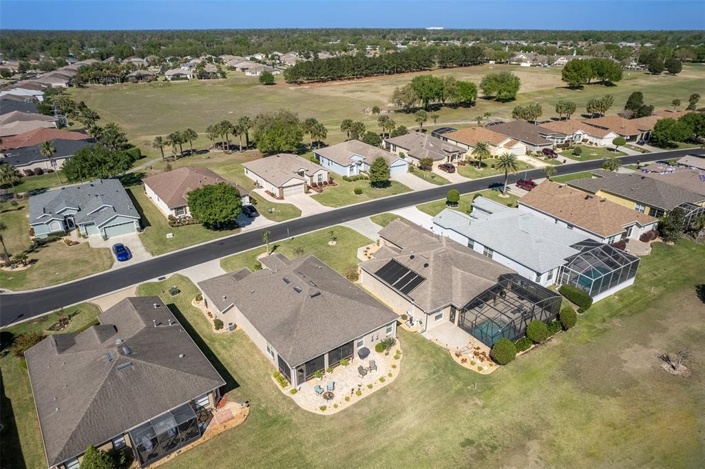 16123 Southwest 14th Avenue Road Ocala, FL 34473 - Photo 57 of 65 an aerial view of residential houses with outdoor space