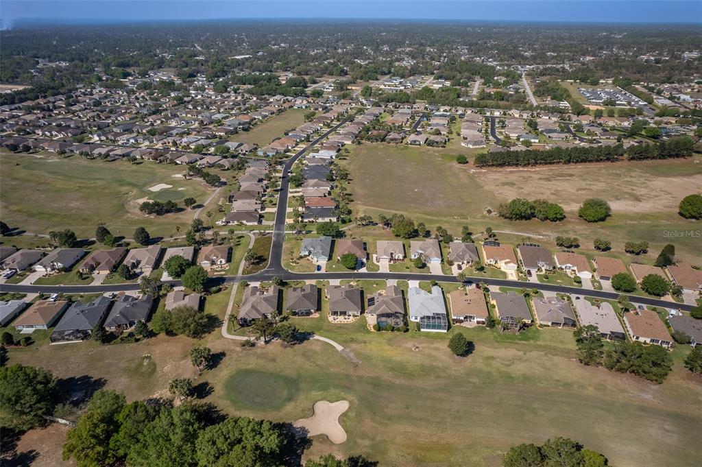 16123 Southwest 14th Avenue Road Ocala, FL 34473 - Photo 62 of 65 an aerial view of residential building with outdoor space