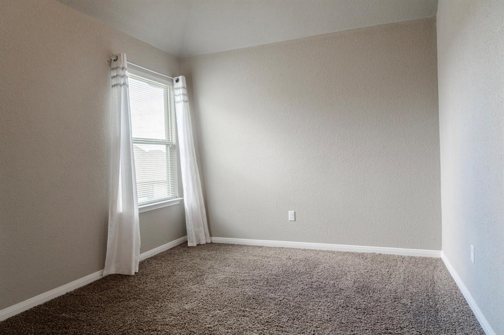 2716 Beutel Road Lorena, TX 76655 - Photo 29 of 39 an empty room with windows and closet