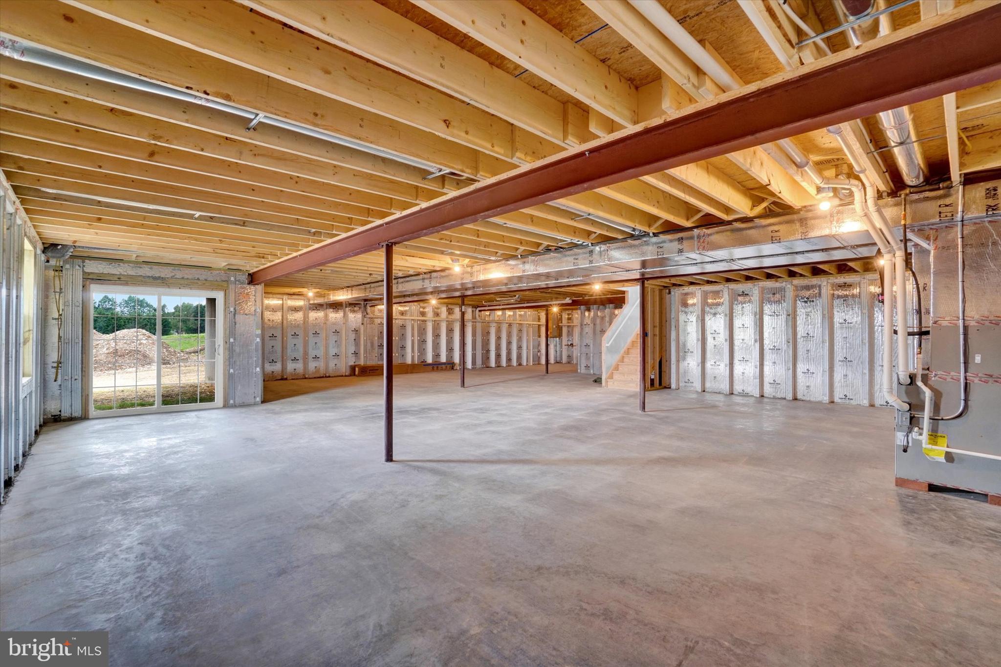 448 Springhouse Lane York, PA 17406 - Photo 31 of 43 Expand in the Unfinished Walk-out Lower Level