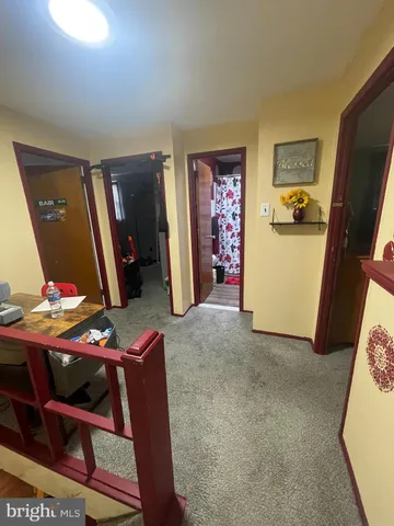 a view of room with furniture and equipment