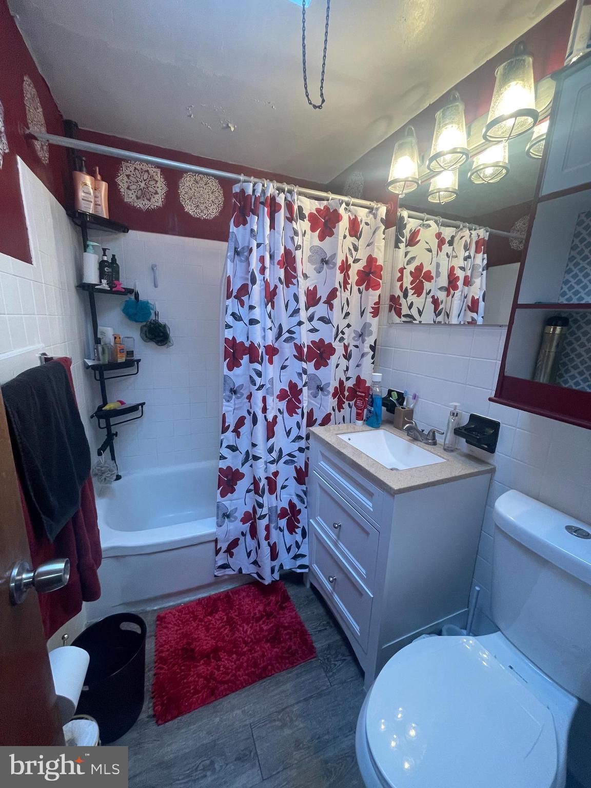 12123 Rambler Road Philadelphia, PA 19154 - Photo 14 of 29 a bathroom with a toilet sink and mirror