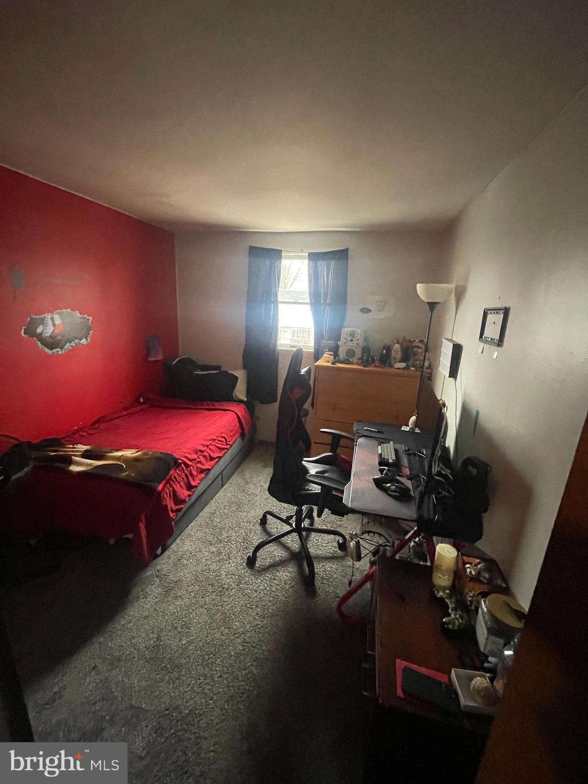 12123 Rambler Road Philadelphia, PA 19154 - Photo 19 of 29 a bedroom with a bed gym equipment and view of living room