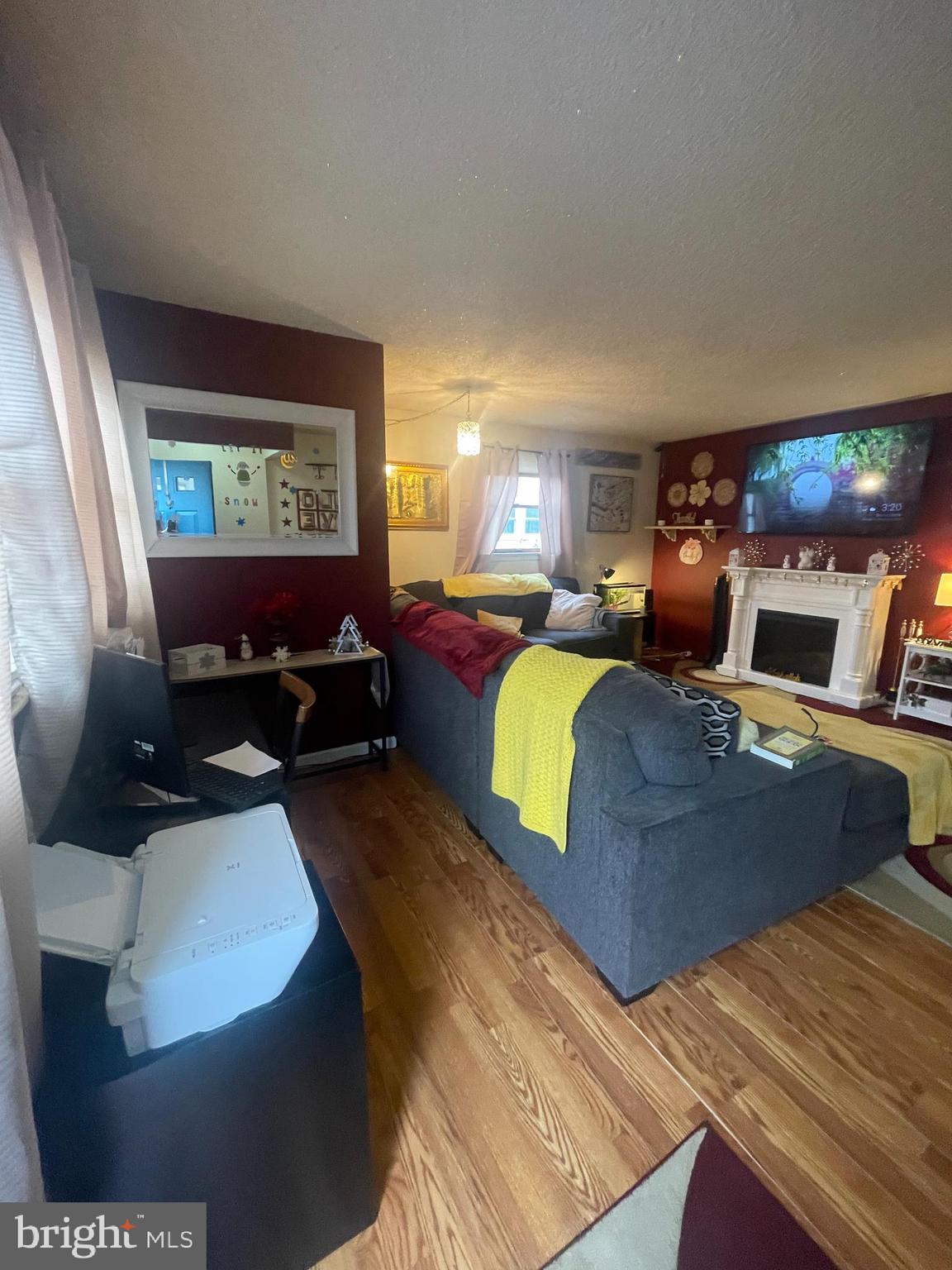 12123 Rambler Road Philadelphia, PA 19154 - Photo 4 of 29 a living room with furniture and a flat screen tv