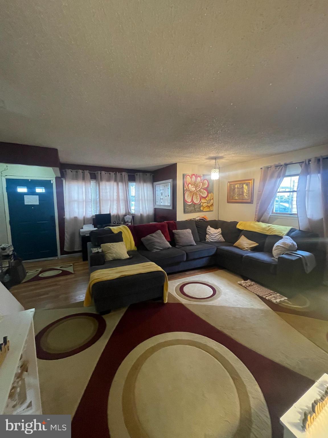 12123 Rambler Road Philadelphia, PA 19154 - Photo 6 of 29 a living room with large couches and large windows