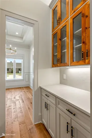 a kitchen with a sink and a fireplace