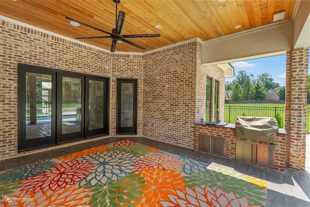 a bedroom with a bed and a fireplace