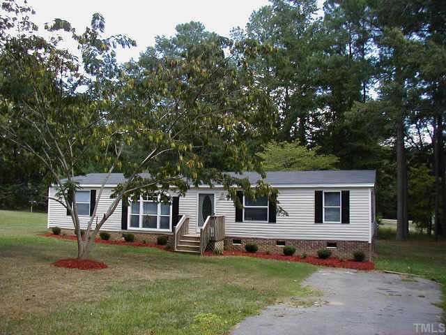 10941 Stage Road Raleigh, NC 27603 - Photo 1 of 1 fresh in every way look at the beautiful trees and landscping. Exterior Front