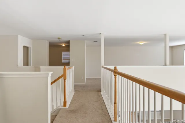a view of a kitchen from the hallway
