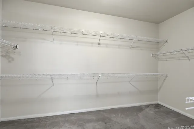 a view of a room with racks on the wall