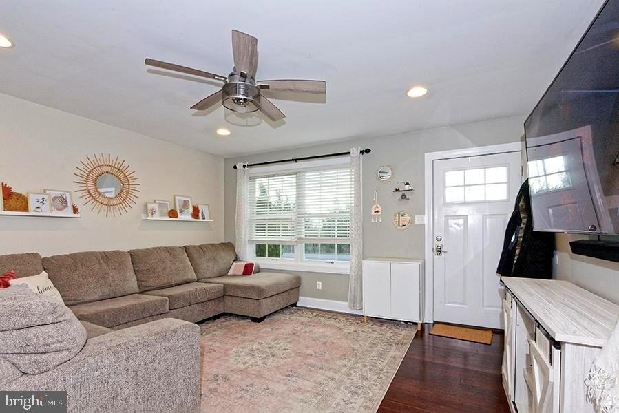 1044 Center Street Tuckerton, NJ 08087 - Photo 11 of 27 a living room with furniture and a flat screen tv