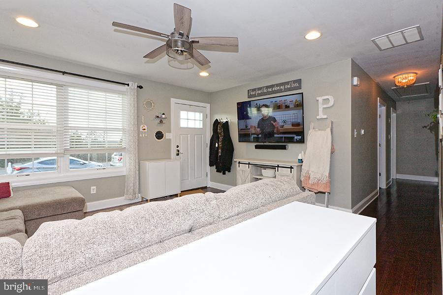 1044 Center Street Tuckerton, NJ 08087 - Photo 13 of 27 a living room with furniture and a flat screen tv