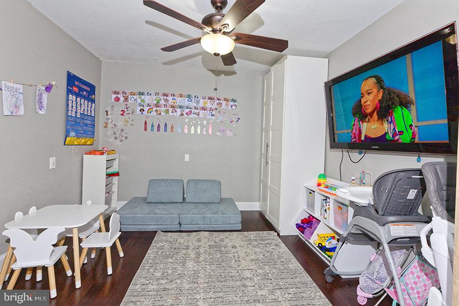 1044 Center Street Tuckerton, NJ 08087 - Photo 17 of 27 a living room with furniture and a flat screen tv
