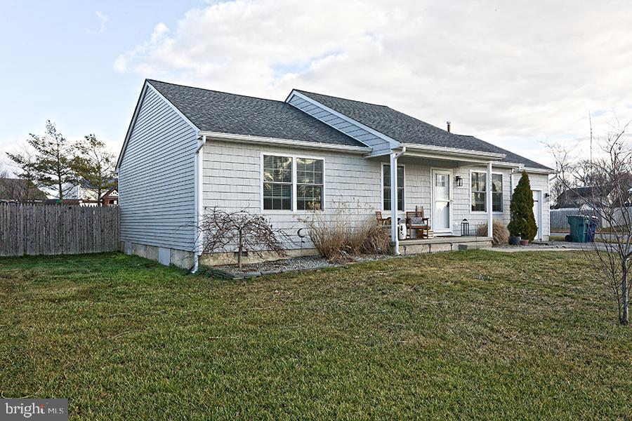 1044 Center Street Tuckerton, NJ 08087 - Photo 4 of 27 a view of a house with a yard and plants