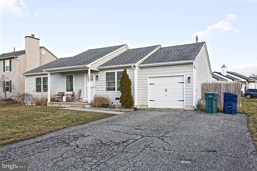 1044 Center Street Tuckerton, NJ 08087 - Photo 5 of 27 a front view of a house with a yard