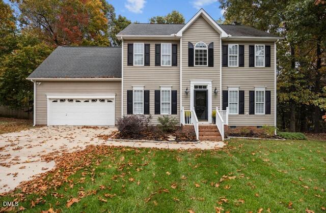 3616 Dewing Drive Raleigh, NC 27616 - Photo 1 of 25 front view of a house with a yard