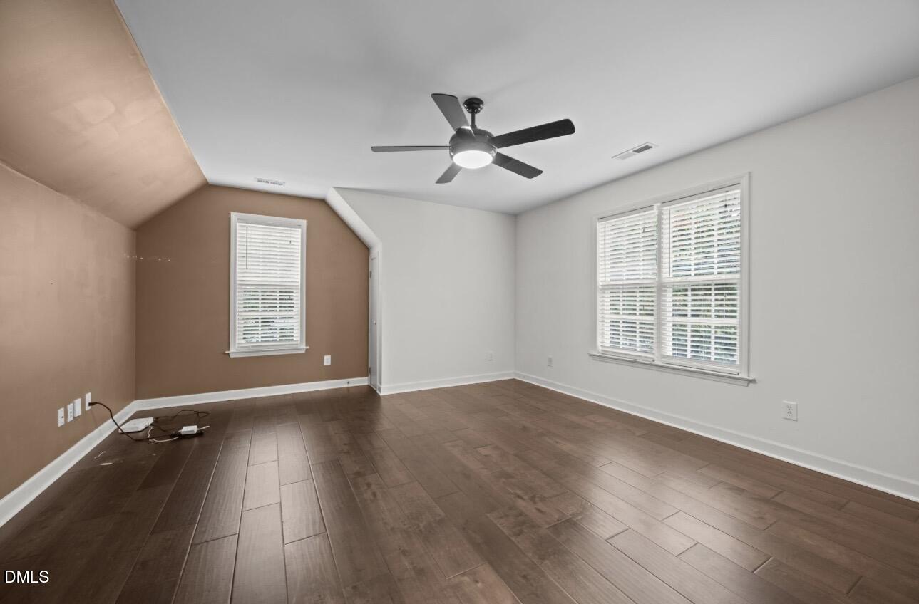 3616 Dewing Drive Raleigh, NC 27616 - Photo 17 of 25 wooden floor in an empty room with a window
